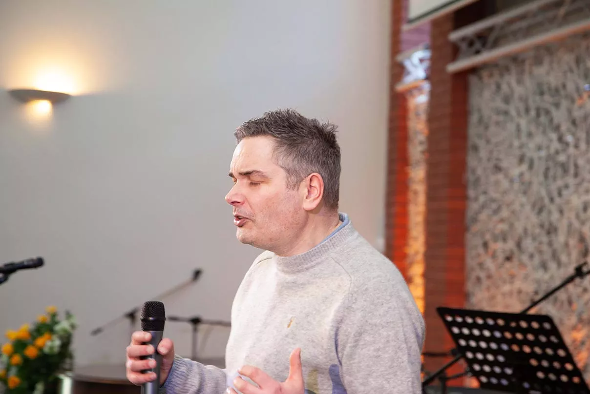 Pastor David praying